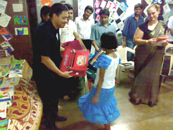 Mr. M Zavala distributing school bags